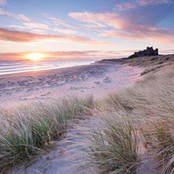 Bamburgh Beach and Castle Greeting Card